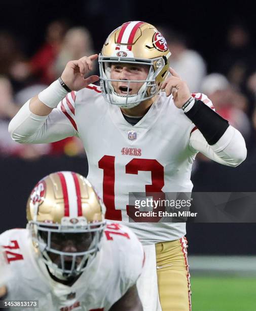 Quarterback Brock Purdy of the San Francisco 49ers calls out a play at the line of scrimmage against the Las Vegas Raiders in the second quarter of...