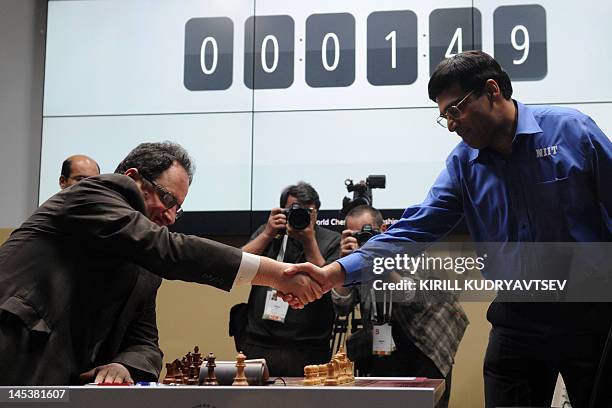 Israel's Boris Gelfand and India's Vishwanathan Anand shake hands during a FIDE World chess championship match in State Tretyakovsky Gallery in...