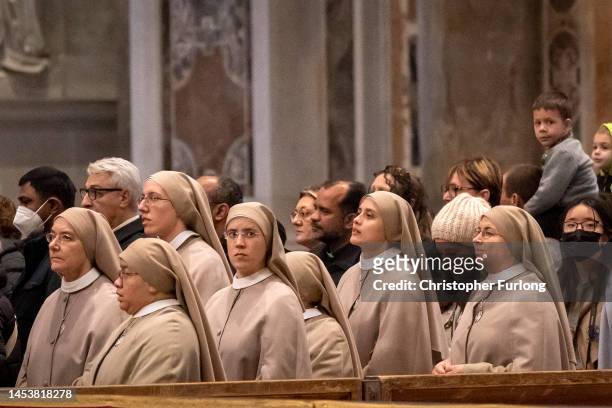 Nuns wait in line to view Pope Emeritus Benedict XVI lying in state at St. Peter's Basilica on January 02, 2023 in Rome, Italy. Joseph Aloisius...