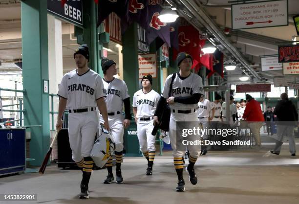 Tristan Jarry, Brock McGinn, Chad Ruhwedel and Josh Archibald of the Pittsburgh Penguins arrive for the 2023 Discover NHL Winter Classic game between...