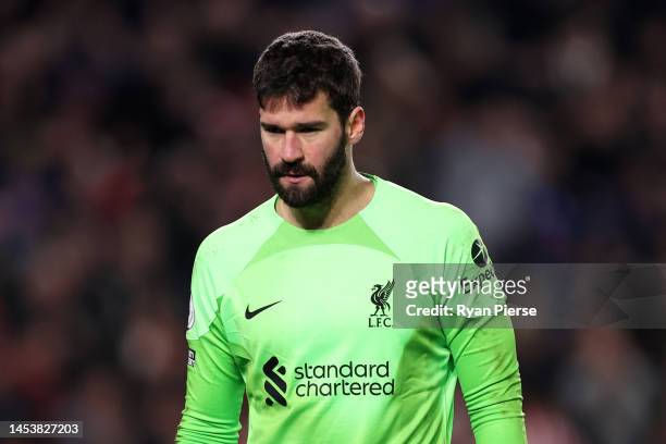 Alisson Becker of Liverpool looks dejected after Yoane Wissa of Brentford scores the team's second goal during the Premier League match between...