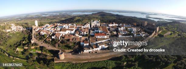 drone panorama of the walled town of monsaraz - évora district stock-fotos und bilder