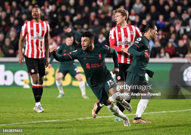 Alex Oxlade-Chamberlain of Liverpool celebrates after scoring the first goal during the Premier League match between Brentford FC and Liverpool FC at...
