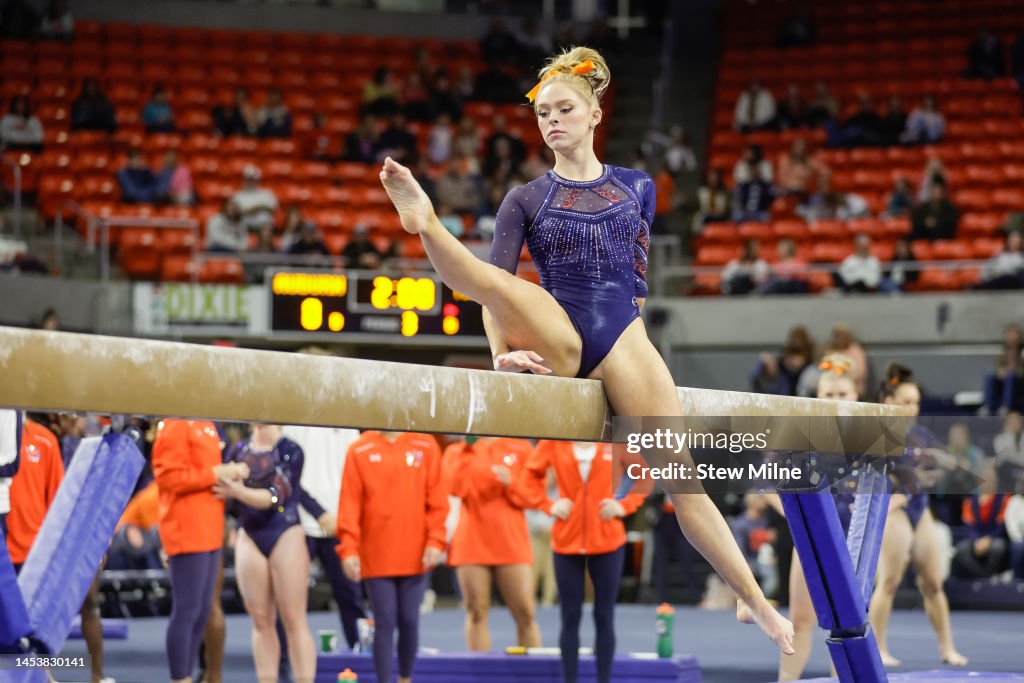 Leigh Oldham of Auburn competes on the balance beam during a