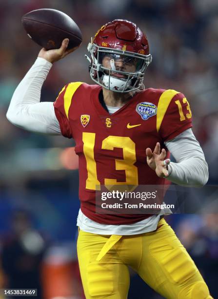 Caleb Williams of the USC Trojans throws a touchdown pass against the Tulane Green Wave in the second quarter of the Goodyear Cotton Bowl Classic on...