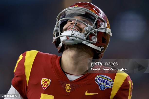 Caleb Williams of the USC Trojans reacts after a completed pass against the Tulane Green Wave in the second quarter of the Goodyear Cotton Bowl...