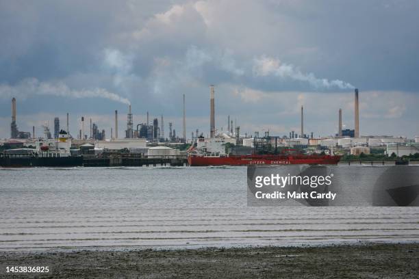 Smoke is seen rising from chimneys at the Fawley Refinery on June 12, 2008 in Southampton, England. The oil refinery located at Fawley in Hampshire...