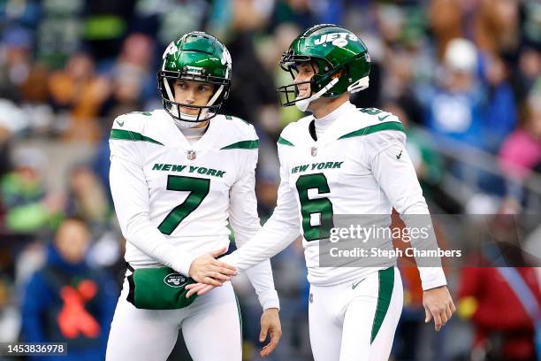 Braden Mann and Greg Zuerlein of the New York Jets react after a field goal attempt against the Seattle Seahawks during the third quarter at Lumen...