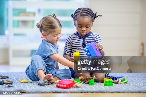 Toddlers Playing with Toys Toddlers Playing with Toys