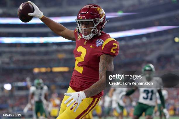 Brenden Rice of the USC Trojans scores a touchdown against the Tulane Green Wave in the second quarter of the Goodyear Cotton Bowl Classic on January...