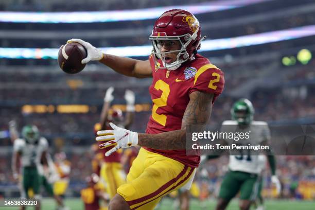 Brenden Rice of the USC Trojans scores a touchdown against the Tulane Green Wave in the second quarter of the Goodyear Cotton Bowl Classic on January...
