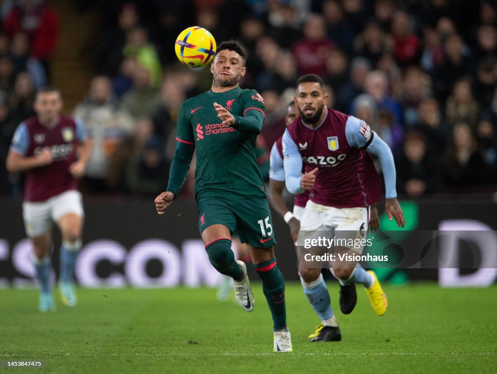 Alex Oxlade-Chamberlain of Liverpool and Douglas Luiz of Aston Villa