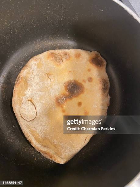 home made middle eastern flatbread; wheat free organic unleavened bread in december 2021 in uk - baking pan stock pictures, royalty-free photos & images