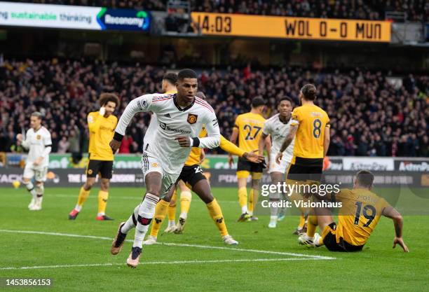 Marcus Rashford celebrates scoring the winning goal for Manchester United during the Premier League match between Wolverhampton Wanderers and...