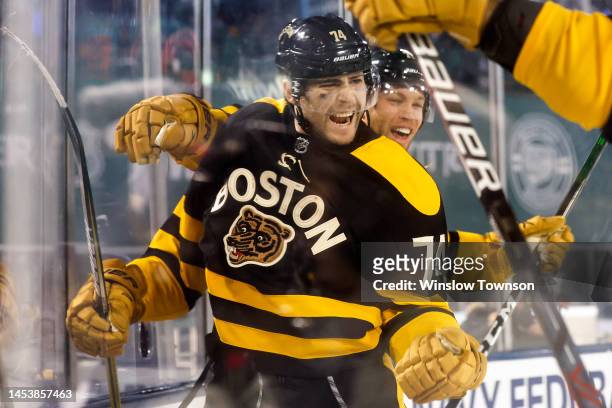 Jake DeBrusk of the Boston Bruins celebrates with teammates after scoring a goal against the Pittsburgh Penguins during the third period in the 2023...