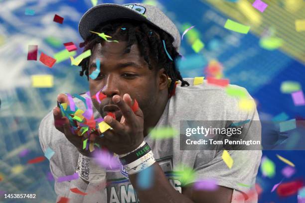 Tyjae Spears of the Tulane Green Wave celebrates during the trophy presentation after the Tulane Green Wave beat the USC Trojans 46-45 in the...
