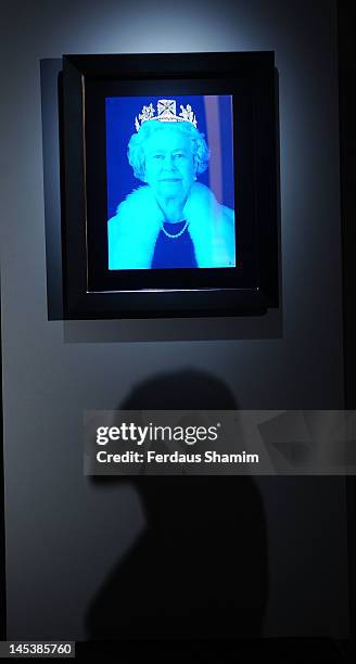 Chris Levine's revamped 2004 seminal 3D portrait of Her Majesty Queen Elizabeth II entitled 'Equanimity' is displayed with an overlaid diadem,...