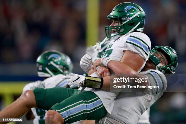 Alex Bauman of the Tulane Green Wave celebrates with Michael Pratt of the Tulane Green Wave after scoring a touchdown against USC Trojans in the...