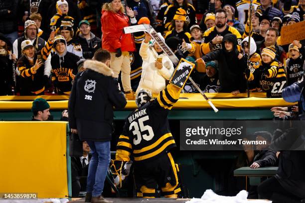 Linus Ullmark of the Boston Bruins leaves the ice after defeating the Pittsburgh Penguins in the 2023 Discover NHL Winter Classic at Fenway Park on...