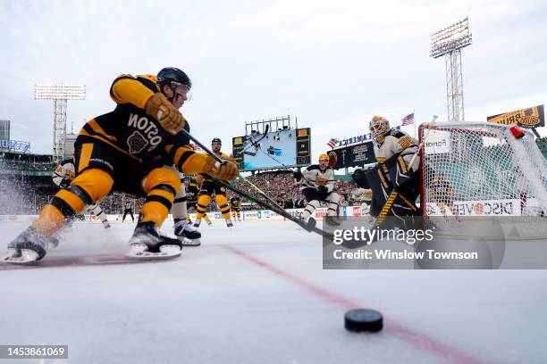 Tristan Jarry of the Pittsburgh Penguins tends the net against the Boston Bruins during the first period in the 2023 Discover NHL Winter Classic at...