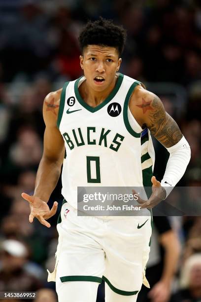 MarJon Beauchamp of the Milwaukee Bucks reacts after hitting a three point shot during the first half of the game against the Washington Wizards at...