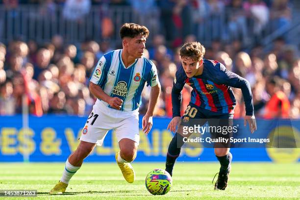Pablo Paez 'Gavi' of FC Barcelona competes for the ball with Nico Melamed of RCD Espanyol during the LaLiga Santander match between FC Barcelona and...