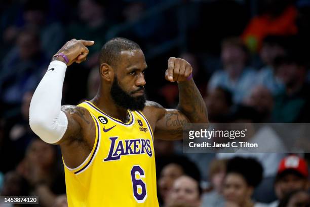 LeBron James of the Los Angeles Lakers reacts following a play during the second quarter of the game against the Charlotte Hornets at Spectrum Center...