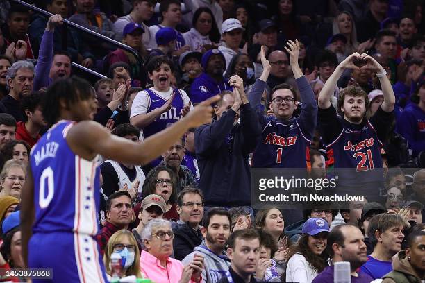 Fans react as Tyrese Maxey of the Philadelphia 76ers enters the game against the New Orleans Pelicans at Wells Fargo Center on January 02, 2023 in...