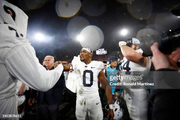 Nicholas Singleton of the Penn State Nittany Lions celebrates with his teammates after defeating the Utah Utes in the 2023 Rose Bowl Game at Rose...