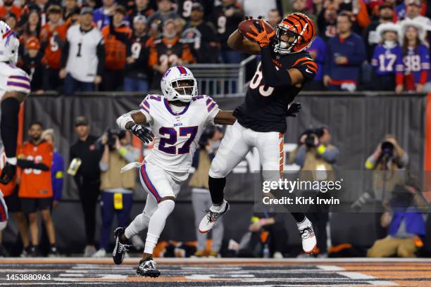 Tyler Boyd of the Cincinnati Bengals catches a touchdown pass against Tre'Davious White of the Buffalo Bills during the first quarter at Paycor...