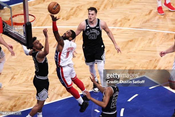 Kyrie Irving of the Brooklyn Nets goes up for a layup during the second quarter of the game against the San Antonio Spurs at Barclays Center on...