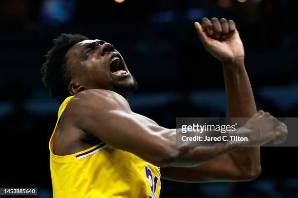 Thomas Bryant of the Los Angeles Lakers reacts following a dunk during the second half of the game against the Charlotte Hornets at Spectrum Center...