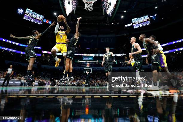 LeBron James of the Los Angeles Lakers drives to the basket during the second half of the game against the Charlotte Hornets at Spectrum Center on...