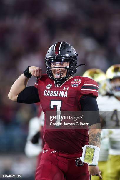 Spencer Rattler of the South Carolina Gamecocks celebrates after scoring a touchdown against the Notre Dame Fighting Irish during the second half of...