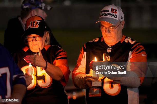 Fans gather for a vigil at the University of Cincinnati Medical Center for football player Damar Hamlin of the Buffalo Bills, who collapsed after...