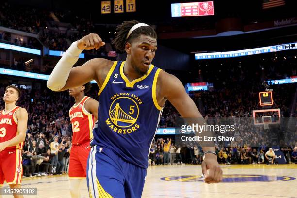Kevon Looney of the Golden State Warriors reacts after he made the game-winning shot at the buzzer of double overtime to beat the Atlanta Hawks at...