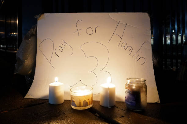 Vigil is displayed at the University of Cincinnati Medical Center for football player Damar Hamlin of the Buffalo Bills after he collapsed following...