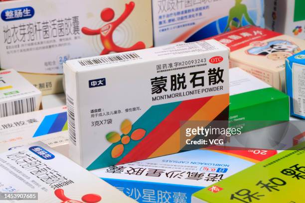 Boxes of antidiarrheal drugs Montmorillonite Powder, Norfloxacin are seen on January 2, 2023 in Anyang, Henan Province of China.