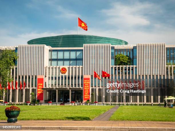 vietnam national assembly at hanoi. next to ho chi minh mausoleum - vietnamese flag stock pictures, royalty-free photos & images