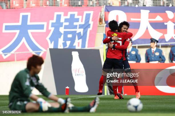Shinzo Koroki of Kashima Antlers celebrates with teammate Yasushi Endo after scoring the team's second goal during the J.League J1 match between...