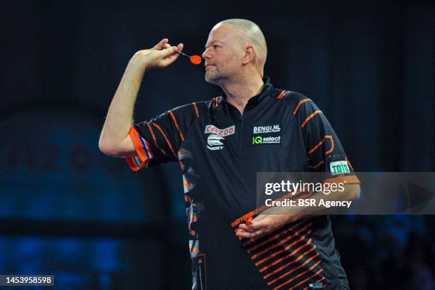 Raymond van Barneveld of the Netherlands in action during Day Six of the Cazoo World Darts Championship at Alexandra Palace on December 20, 2022 in...