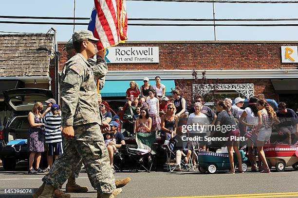 Members of the 102nd Infantry National Guard from Norwalk, CT participate in the annual Memorial Day Parade on May 28, 2012 in Fairfield,...