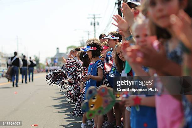 Children watch area veterans in the annual Memorial Day Parade on May 28, 2012 in Fairfield, Connecticut. Across America towns and cities will be...