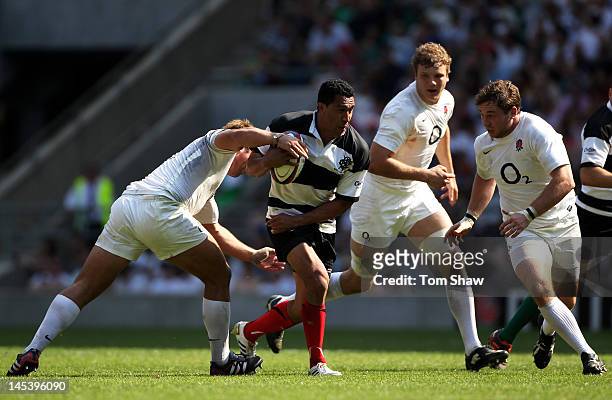 Mils Muliaina of The Barbarians charges upfield during the Killik Cup match between England and The Barbarians at Twickenham Stadium on May 27, 2012...