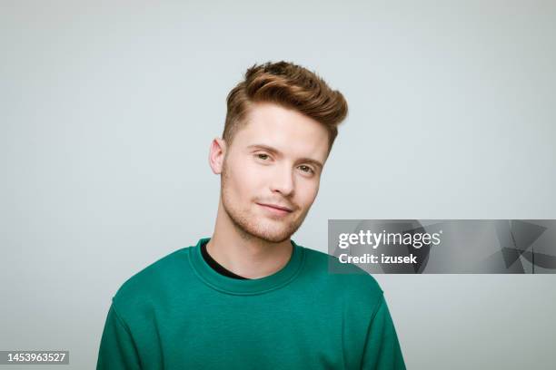 headshot of a young volunteer - man blouse stock pictures, royalty-free photos & images