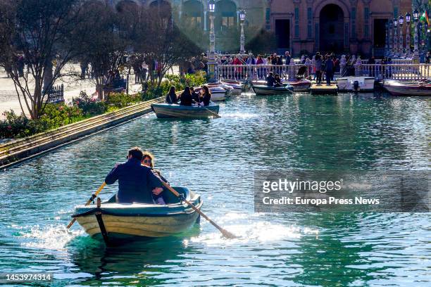 Tourists take a boat ride on the estuary of the Plaza de España on January 03, 2023 in Seville Taking advantage of the last Christmas holidays,...