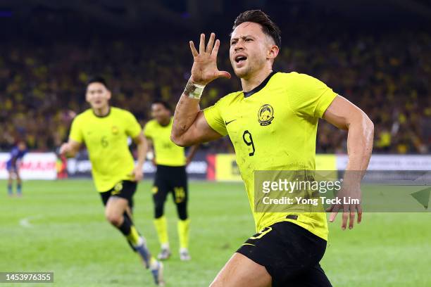 Darren Lok of Malaysia celebrates after scoring the team's first goal against Singapore in the first half during the AFF Mitsubishi Electric Cup...