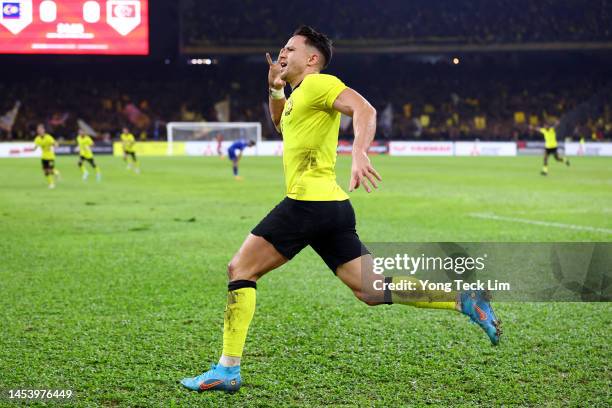 Darren Lok of Malaysia celebrates after scoring the team's first goal against Singapore in the first half during the AFF Mitsubishi Electric Cup...