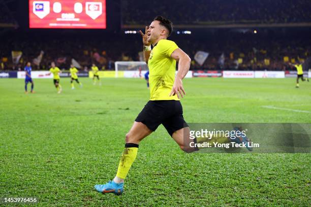 Darren Lok of Malaysia celebrates after scoring the team's first goal against Singapore in the first half during the AFF Mitsubishi Electric Cup...