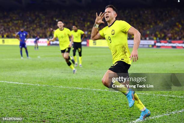 Darren Lok of Malaysia celebrates after scoring the team's first goal against Singapore in the first half during the AFF Mitsubishi Electric Cup...